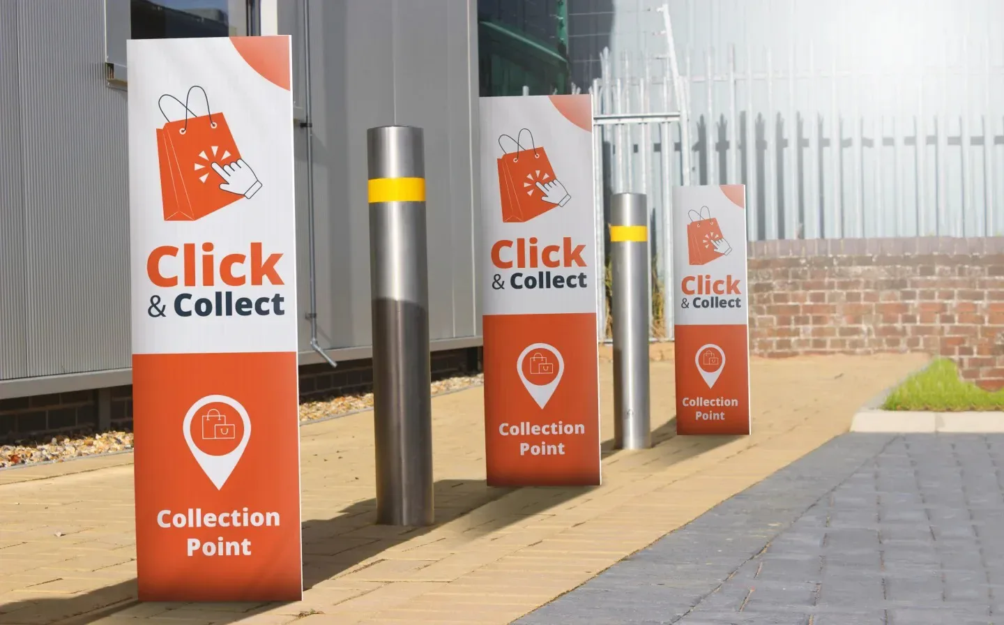 A trio of bollard covers indicating click-and-collect points for convenient pickup services