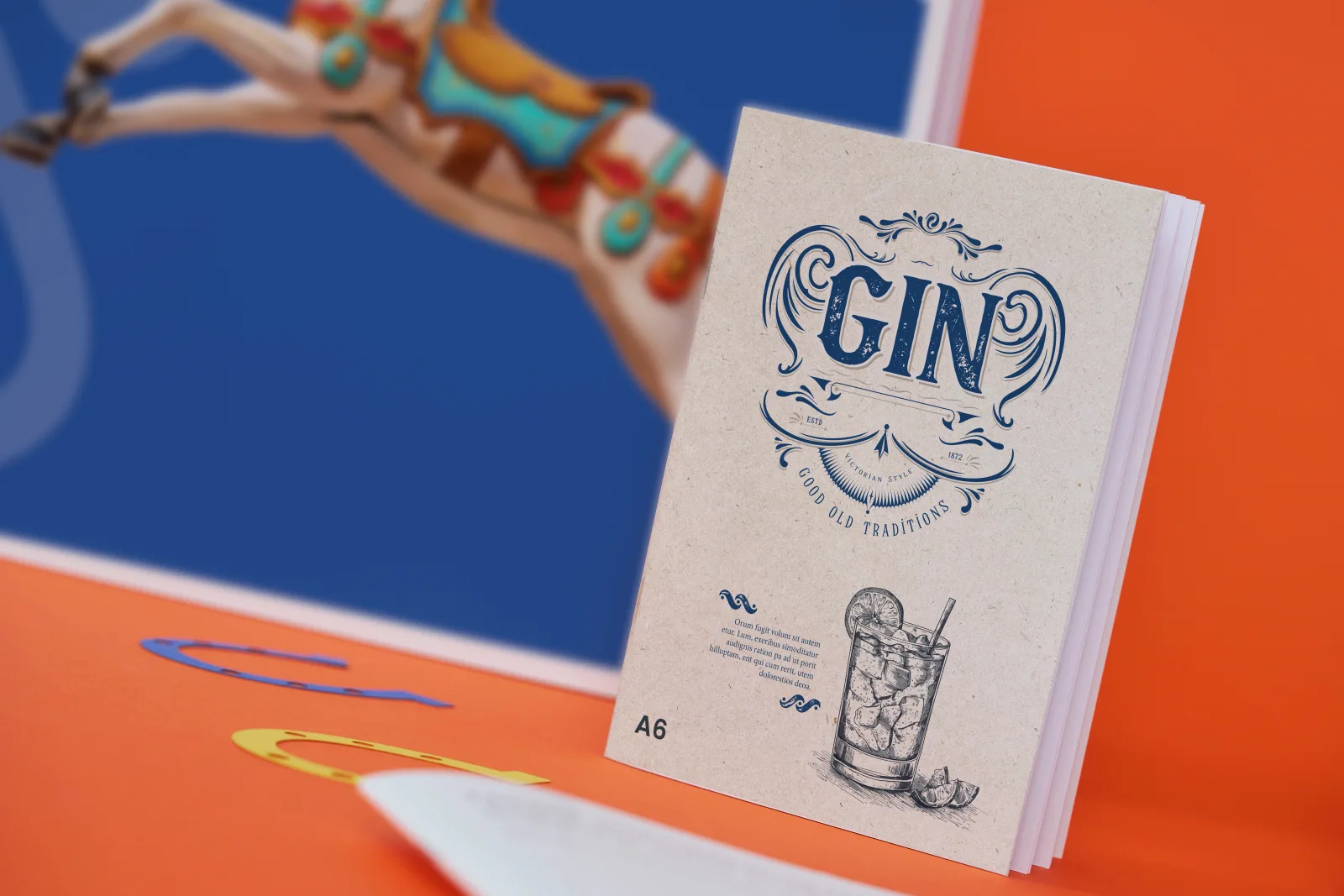 A5 portrait saddle stitched stapled booklet with gin title and image of cocktail on a bright orange background