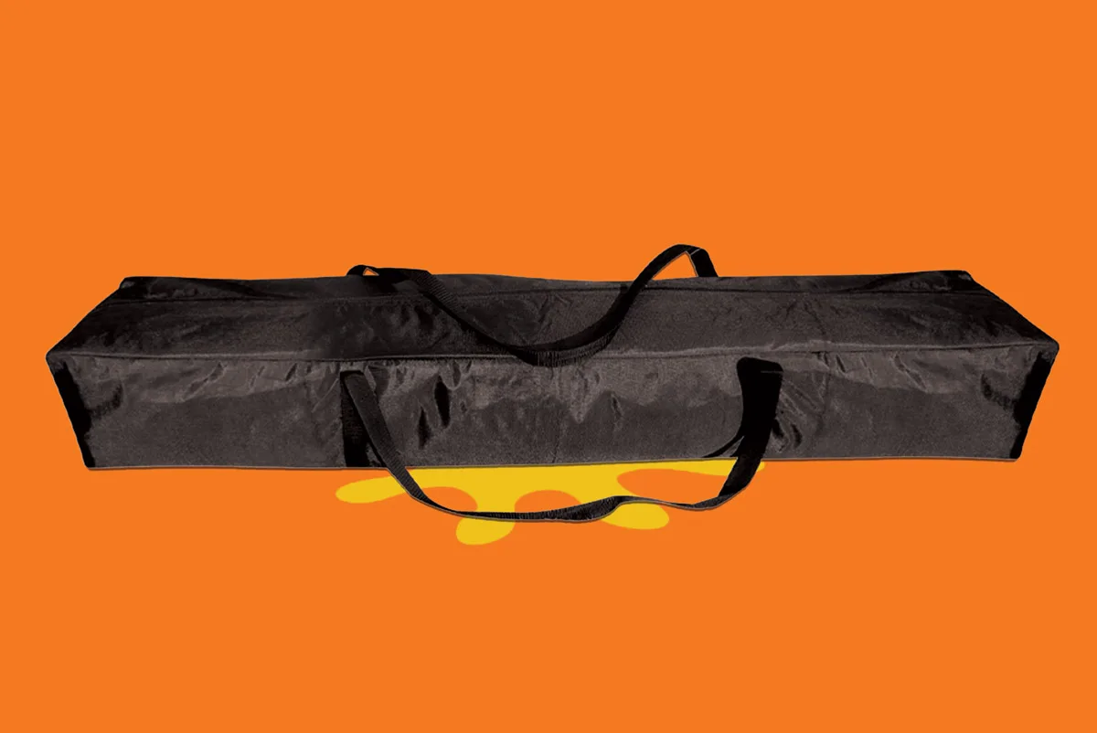 A black rectangular carrying bag with handles on an orange background.