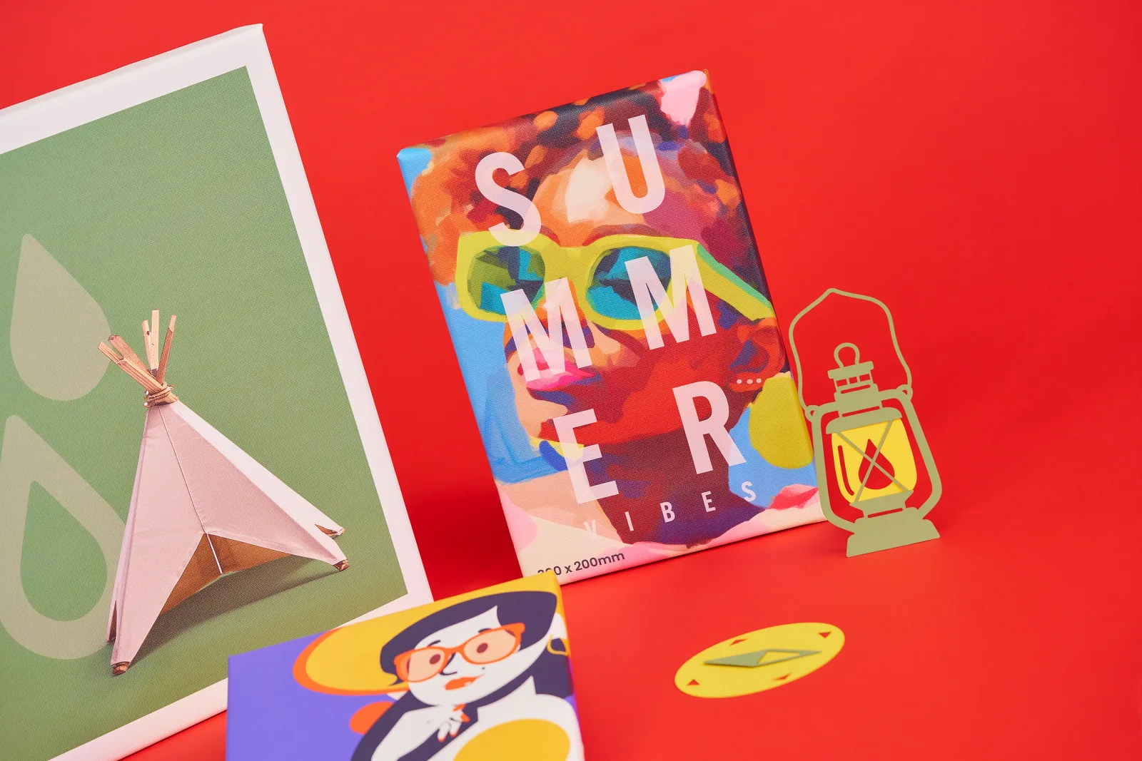 3 canvas prints one green with canvas tent image one with abstract lady in sunglasses with the text 'summer. one with an illustration of a woman with sunglasses on a bright red background wi