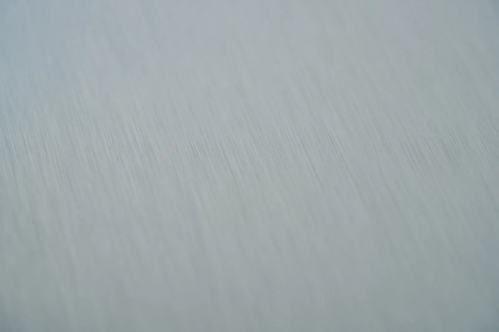 Close up showing the detail of a brushed aluminium dibond sign