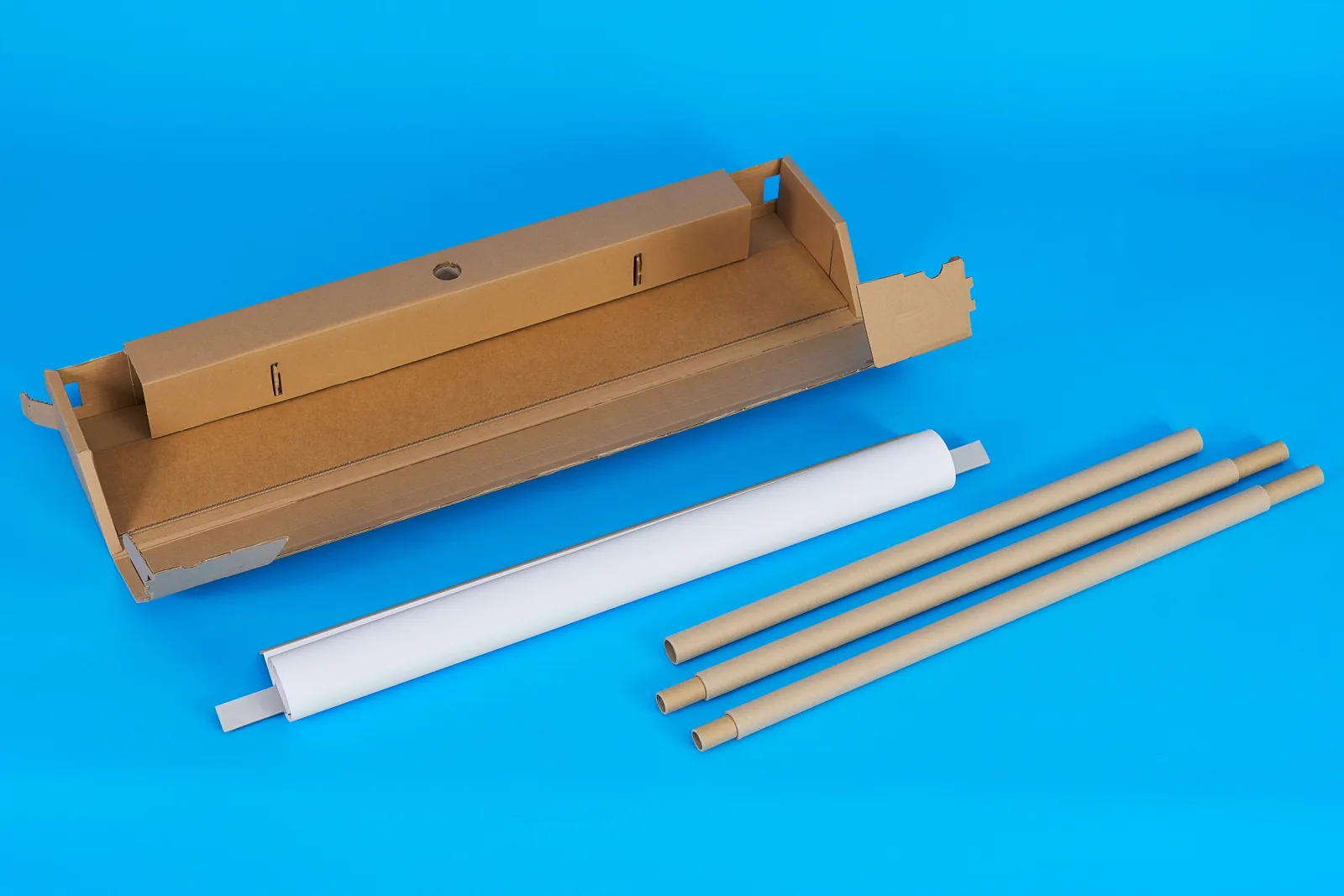 all components laid out on a bright blue background for a eco friendly roller banner