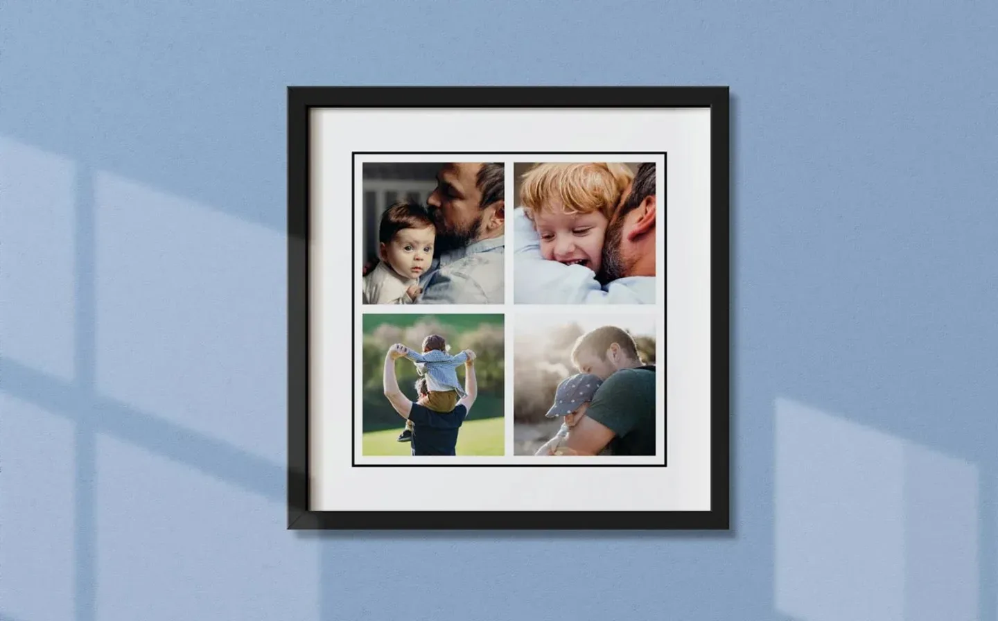 A framed print of a family portrait displayed on a blue wall
