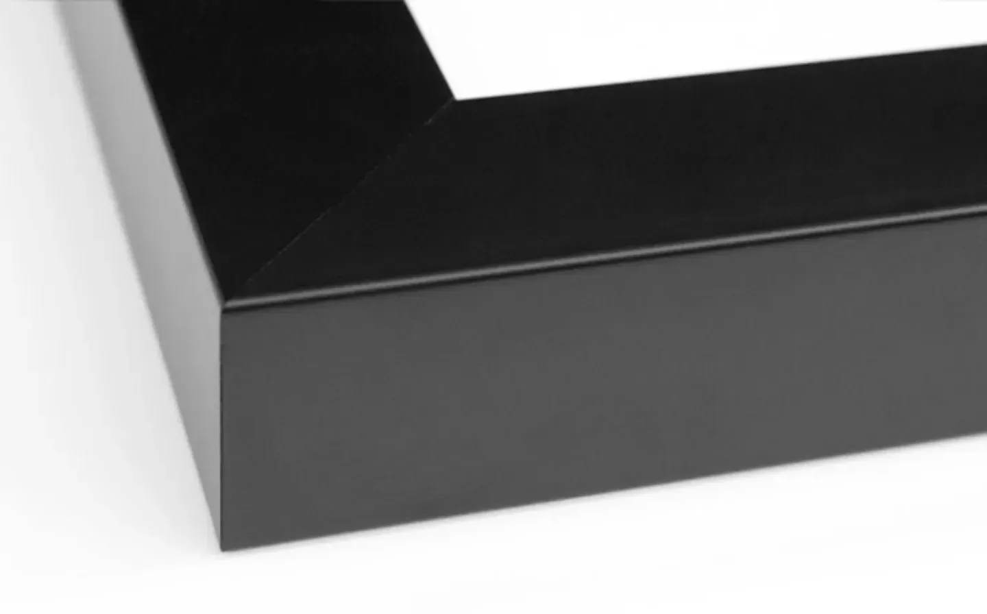 A close-up view of a black square frame surrounding a white background