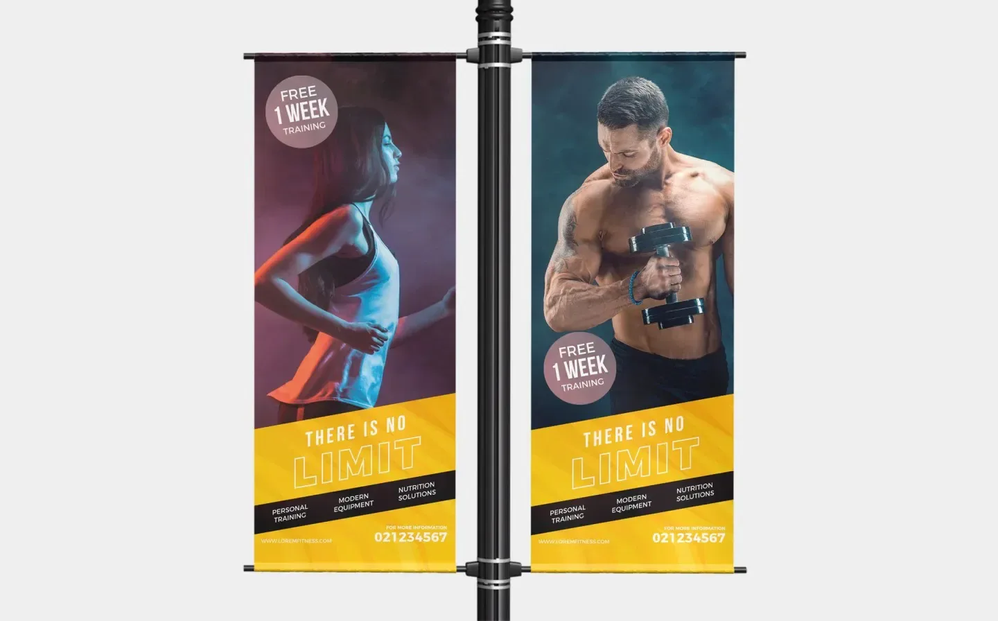 A banner for a gym, featuring vibrant designs, displayed on a lamp post to promote fitness