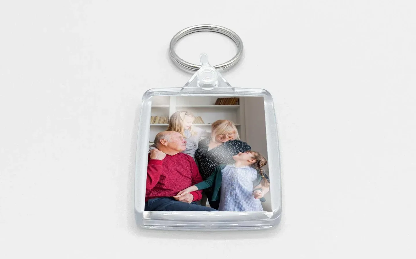 A key chain featuring a family photo, capturing a cherished moment together in a compact and portable format