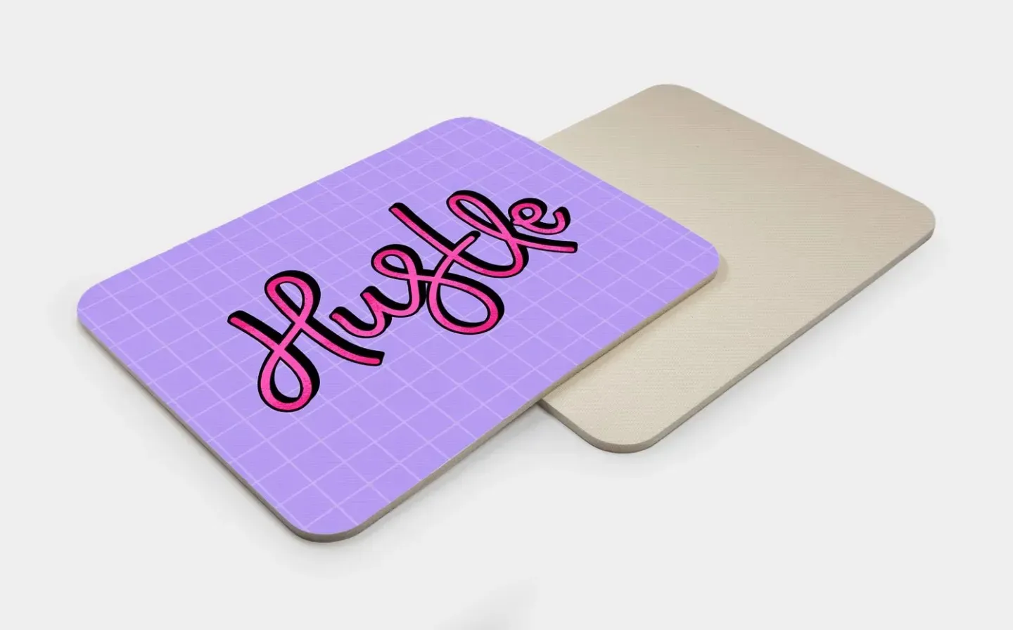 Custom mouse mat showcasing "hustle" in purple on one side, with a textured material on the reverse side