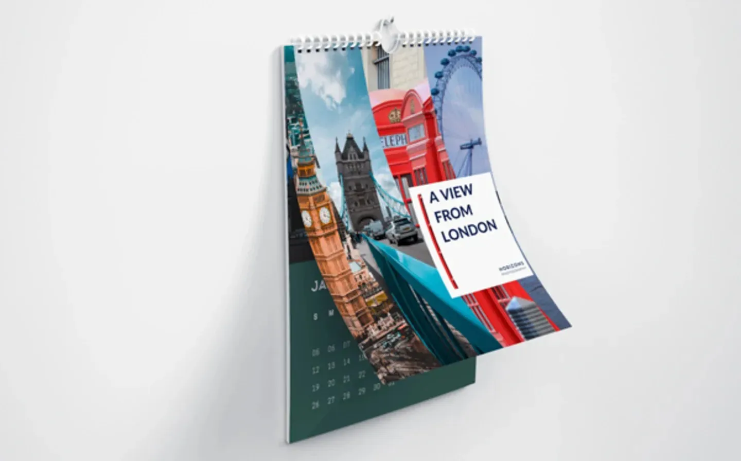A wall-mounted calendar featuring a scenic image of London