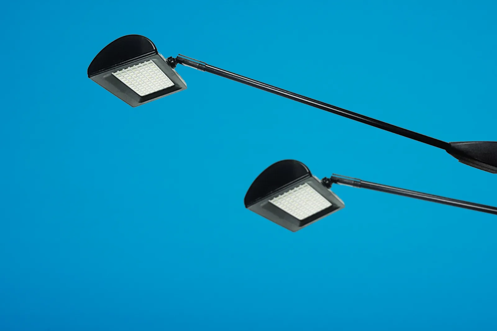 set of 2 black lights on a bright blue background