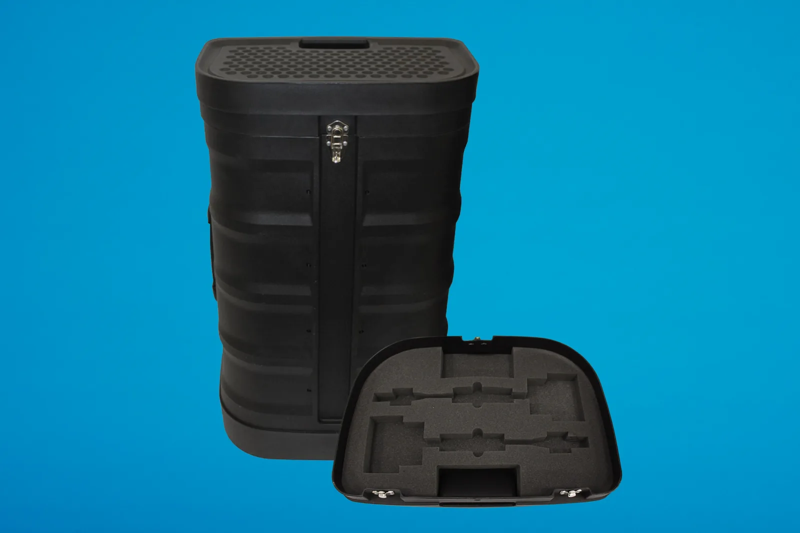 wheeled carry case to store and transport a pop up stand and all components removable  lid with protective foam to store lights ona. bright blue background
