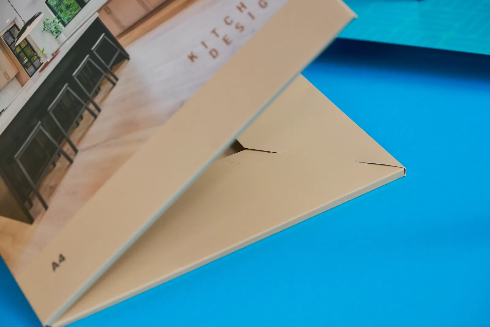 close up of a printed cream interlocking presentation folder